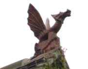 detailed dragon finial design installed on the roof
